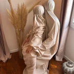 Robe de prière Kuala Lumpur rose poudre mere et fille sur els genoux de sa maman